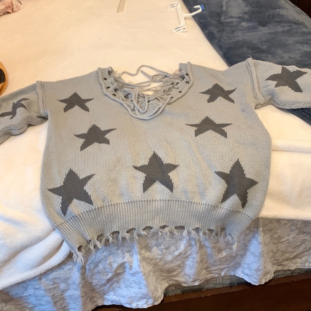 Cropped Star sweater . Woth lace up detail on front and back